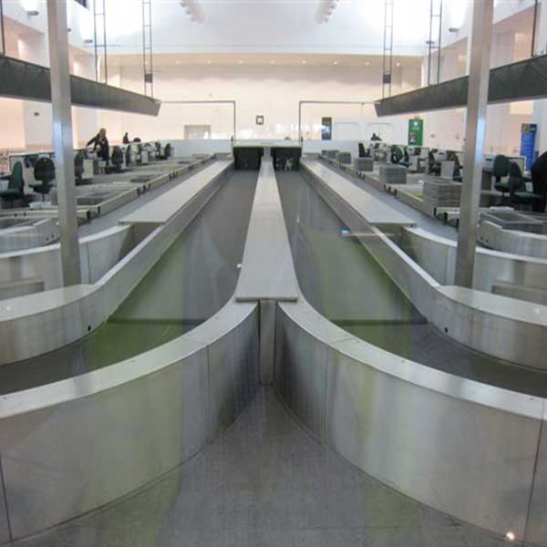 Belt Curves for Airport Baggage Handling Systems