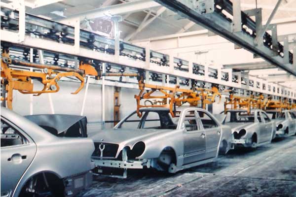 Car Bodies on a MCM AT500 Power & Free Conveyor Car Bodies on a MCM AT500 Power & Free Conveyor