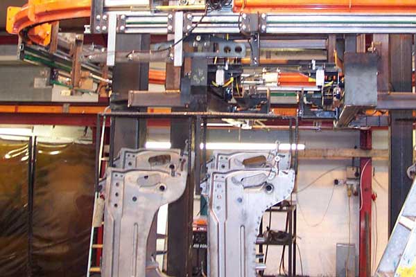 Suspension parts on a MCM AT100 Power & Free Conveyor Suspension parts on a MCM AT100 Power & Free Conveyor