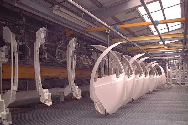 Injection Mouldings on a MCM Powertrack 60 Conveyor