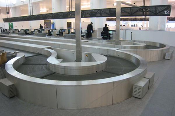 Belt Curves for Airport Baggage Handling Systems